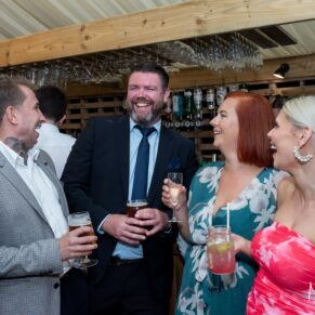 Lots of banter amongst the friends during the relaxed dinks reception