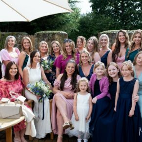 All the ladies gather for this relaxed group pose during the drinks reception