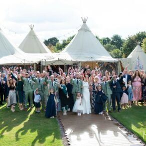 Everyone gathers outside the tipi on this glorious sunny day for a relaxed group pose