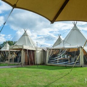 The fabulous tipi under a blue sky at Dovecote Events in Oxfordshire