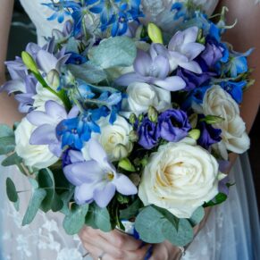 The bride's gorgeous blue and white wedding bouquet seen here in all its glory at The Great House in Sonning