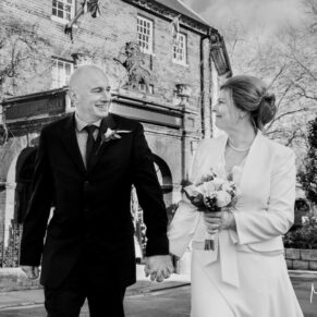 The bride and groom enjoy a walk near the church in the town before their Hotel Du Vin Henley wedding reception