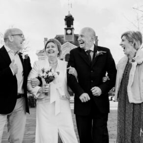 The newlyweds take a stroll the the town before their Hotel Du Vin Henley wedding reception