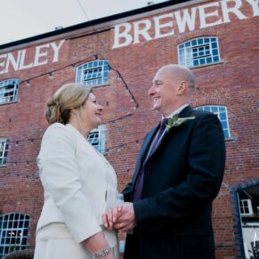 The bride and groom in the courtyard during their Hotel Du Vin Henley wedding reception