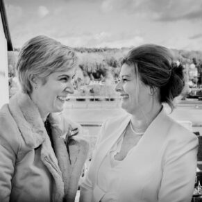The bride captured in a candid moment during her Hotel Du Vin Henley wedding reception