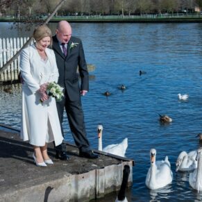 The bride and groom go to see the swans on the river in the town centre before their Hotel Du Vin Henley wedding reception