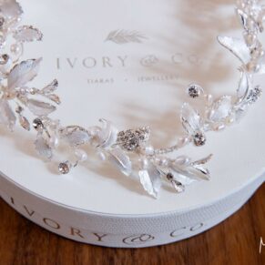 Close-up shot of the fine details on this gorgeous wedding cake at Rackleys Barn