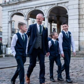 The groom with his young ushers arrive for the civil ceremony at the Guildhall in Windsor just prior to the wedding ceremony