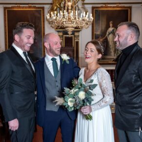 Group pose taken in the Guildhall after the civil ceremony