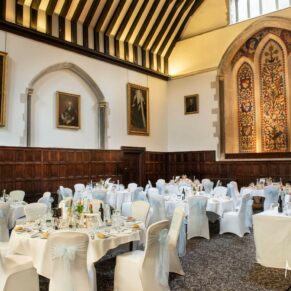 The historic Great Hall at Bisham Abbey all setup for the wedding breakfast