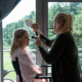 Hair and make-up time at Cotswolds Hotel, Golf and Spa wedding