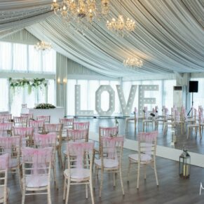 Cotswolds Hotel, Golf and Spa wide angle photography of the marquee interior captured just before the civil wedding ceremony