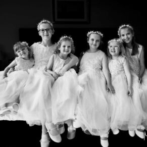 The bridesmaids strike a dramatic photography pose prior to the wedding ceremony at Cotswolds Hotel, Golf and Spa