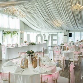 Wide angle marquee interior view at Cotswolds Hotel, Golf and Spa wedding venue