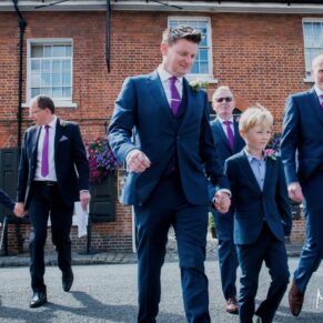 I love capturing natural shots like this one of the lads crossing the road, the low down angle really adds to the drama for this reportage moment. I'd asked to guys to pretend I wasn't really there as they dashed through the oncoming traffic on Old Amersham High Street. I just need to ensure I have one eye on the speeding cars at all times, the last thing anyone wants is to see an injured photographer on the day. The reception venue for the day was the fabulous Kings Chapel which is located 80 metres from where I captured this image. outside the Crown Hotel. The groom and the lads crossing the road in Amersham High Street prior to his Kings Chapel wedding reception