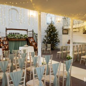 The interiors all set up for a Christmas civil wedding ceremony at the Kings Chapel in Old Amersham