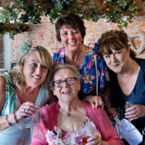 Four ladies in a relaxed pose for the camera
