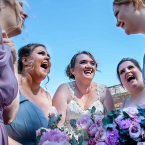 The ladies gather for a small group giggle at Meols Hall in the gardens