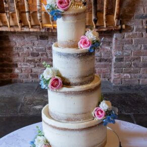 Meols Hall wedding cake captured in the barn with natural daylight