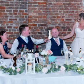 The lively bride's speech in full swing at her Meols Hall wedding reception