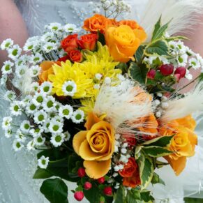 A close-up of the bride's colourful bouquet