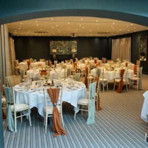 Dining room all set up for the wedding breakfast at The Manor House Hotel Moreton-in-Marsh