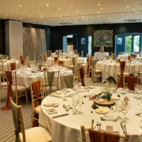 The wedding breakfast setup at The Manor House Hotel in Moreton-in-Marsh