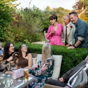 Cathing up with the banter over the hedgerow