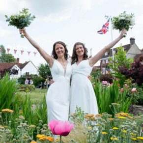 The newlyweds venture down to the High Street for some photo opportunities soon after their Kings Chapel's Old Amersham wedding ceremony