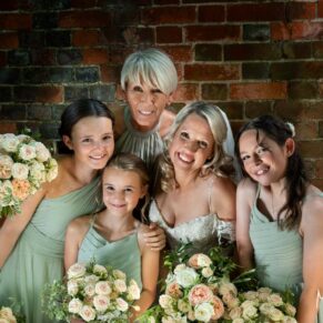 When I'm lighting my images, I'm always looking for a sprinkle of magic! For this picture of the bride with her bridesmaids I opted for an unassuming old brick wall, then I added to the mix a few directional lights to create a wow impact effect. Sometimes the simplest of backdrops can be used to the great effect, it's all about the lighting and composition for this wedding pose at the Kings Chapel in Old Amersham. The bride with her bridesmaids captured with some dramatic lighting at her Kings Chapel Old Amersham wedding