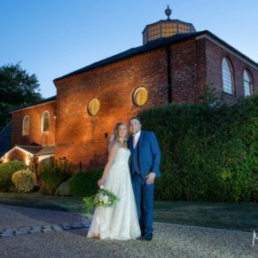 I always carry floodlighting to every wedding I attend, and when the dusky skies are fleetingly perfect I usually venture outdoors with the newlyweds for a few dramatic poses. In this instance, the historic building is totally lit by my directional lighting to create the wow effect you see here. The warmth and softness of the lighting is critical to ensure the resulting image is perfect! The newlyweds at dusk outside the Kings Chapel in Old Amersham on their wedding day