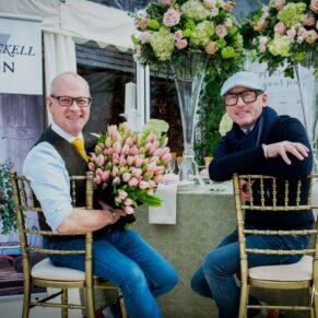 Commercial photography assignments for small and large businesses in the Buckinghamshire area and beyond - this photograph showcases two florists set up for an exhibition at a trade fair