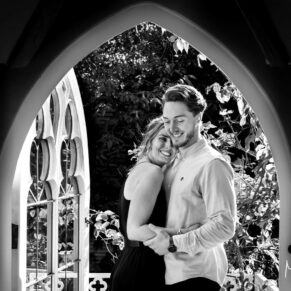Very relaxed couple portraits photography captured in a feature window in Buckinghamshire