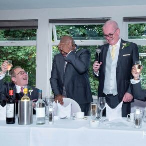 Photography of the speeches in full flow at this Badgemore Park wedding reception in Oxfordshire