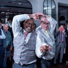 Action photography of the newlyweds dancing during the evening reception at their Badgemore Park wedding reception