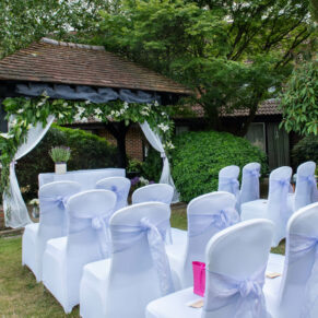 Photography of the outdoor civil wedding ceremony setup at Fredrick's Hotel in Maidenhead