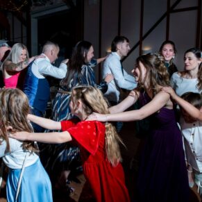 Winters Tale Country Barn wedding photography of the evening dancing getting pretty lively with a conga line dance