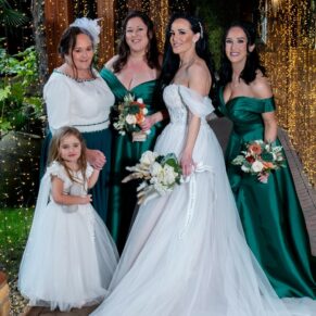 Relaxed wedding photography pose in the twinkling light tunnel at this Crazy Bear Hotel winter in Stadhampton